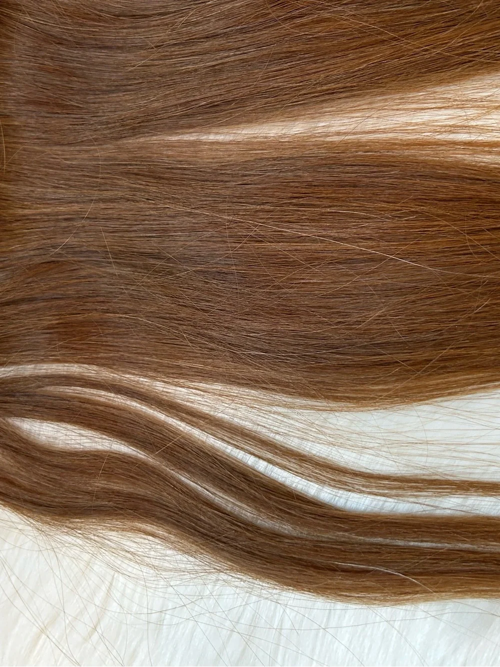 Hair Extensions. 2 rows. Salon quality  20in hand sewn genius weft light brown.